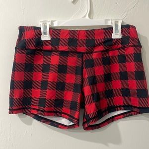 Born primitive black and red, plaid shorts
